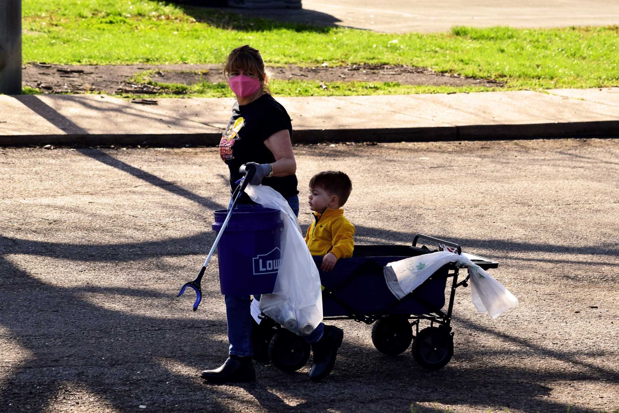 Volunteers clean up Marquette Park in Dutchtown, St. Louis, MO.