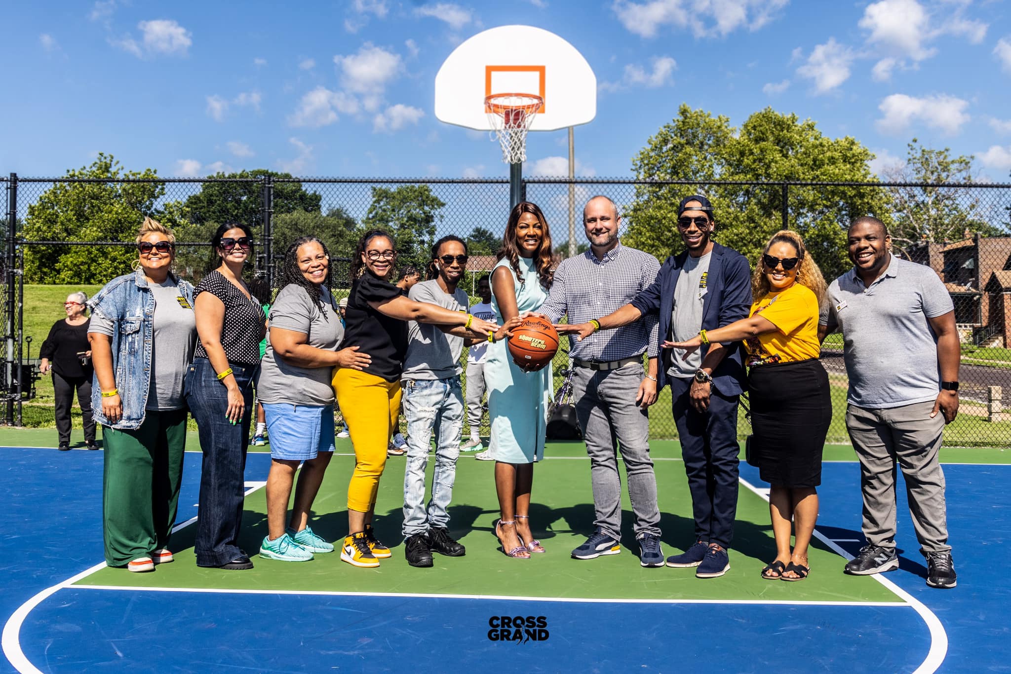 St. Louis Mayor Tishaura Jones and 3rd Ward Alderman Shane Cohn appear with Allies of Marquette Park and Dutchtown Main Streets board members at the ribbon cutting for the new basketball courts at Marquette Park. Photo by Chip Smith of Cross Grand.
