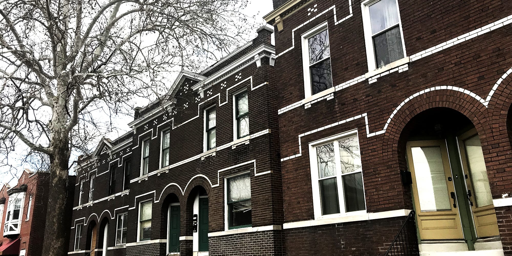 Four-family apartment buildings on Virginia Avenue in the Dutchtown Community Improvement District.